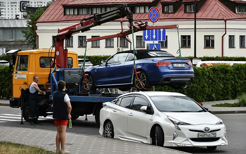 Can HOA Tow My Car? FAQs For The Board And Homeowners